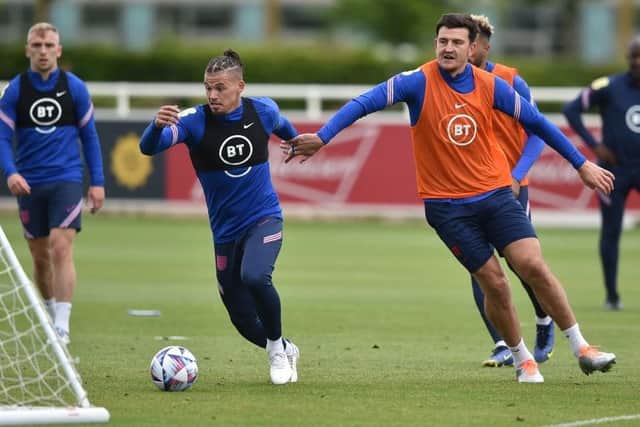 CLINGING ON: The Yorkshire pair of Kalvin Phillips (left) and Harry Maguire (right) have kept their England places despite not playing club football this season