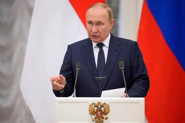 Russian President Vladimir Putin attends a press conference. PIC: ALEXANDER ZEMLIANICHENKO/POOL/AFP via Getty Images