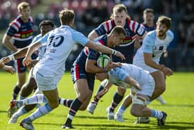 Making headway: Doncaster Knights in action against long-time rivals Bedford Blues in the RFU Championship earlier this season. Doncaster are trying to put the building blocks in place for long-term sustainability. (Picture: Tony Johnson)