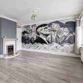 The living room with the mural