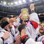 PARTY TIME: Sheffield Steelers' Rob Dowd, Jonathan Phillips and Davey Phillips celebrate winning the World Championship Division 1A trophy in Nottingham. Picture courtesy of Dean Woolley/Ice Hockey UK