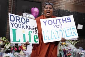 People protesting against knife crime at the scene in Croydon, south London, where 15-year-old Elianne Andam was stabbed to death. PIC: Jordan Pettitt/PA Wire