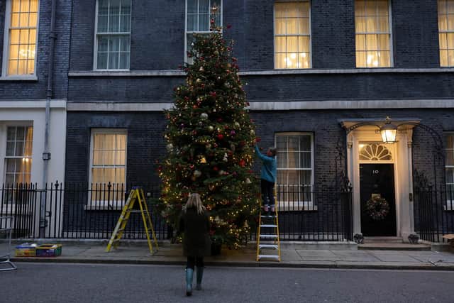 Christmas Tree arrives in Number 10. The Number 10 Christmas Tree supplied by York Christmas Trees arrives in the street. Picture by Andrew Parsons / No 10 Downing Street