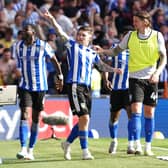 WE CAN BE HEROES: Sheffield Wednesday's Josh Windass (centre) celebrates scoring their side's first goal of the game with team-mats during the Sky Bet League One play-off final at Wembley Stadium, London. Picture: Nick Potts/PA