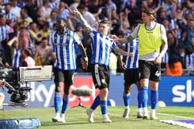 WE CAN BE HEROES: Sheffield Wednesday's Josh Windass (centre) celebrates scoring their side's first goal of the game with team-mats during the Sky Bet League One play-off final at Wembley Stadium, London. Picture: Nick Potts/PA