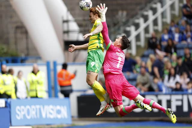 HEADTART: Huddersfield Town goalkeeper Lee Nicholls in unable to stop Norwich City's Josh Sargent opening the scoring