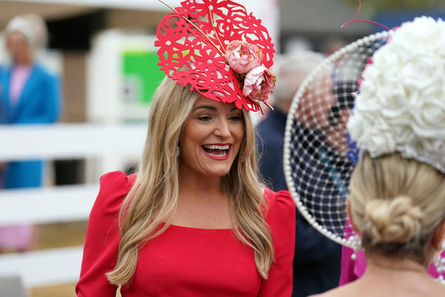 A racegoer during day two of the Randox Grand National Festival at Aintree Racecourse, Liverpool. (Photo credit: Mike Egerton/PA Wire)