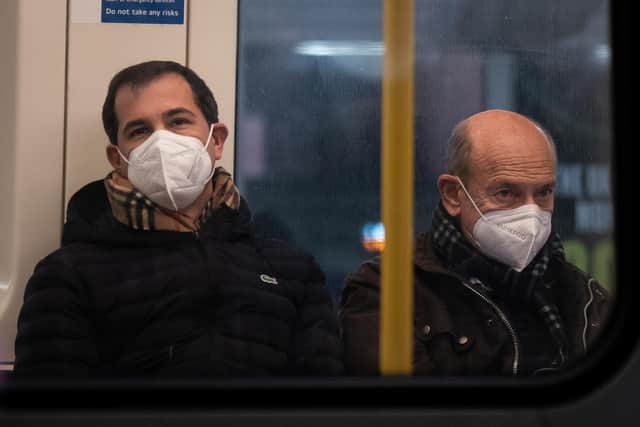 Members of the public wearing masks at Westminster Station on the London Underground circle line. No 10 has stressed that it is "not compulsory" to wear a mask while ill after a Cabinet minister said it was "sensible" to do so if travelling. Professor Susan Hopkins, chief medical adviser at the UK Health Security Agency (UKHSA), issued advice on Monday saying adults should "wear a face covering" if they have to leave the house while feeling unwell.