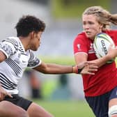 Scarborough's Zoe Aldcroft of England breaks a tackle to score a try during the Pool C Rugby World Cup 2021 New Zealand match between Fiji and England at Eden Park on October 08, 2022, in Auckland, New Zealand. (Picture: Phil Walter/Getty Images)