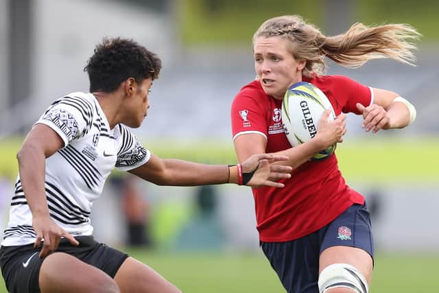 Scarborough's Zoe Aldcroft of England breaks a tackle to score a try during the Pool C Rugby World Cup 2021 New Zealand match between Fiji and England at Eden Park on October 08, 2022, in Auckland, New Zealand. (Picture: Phil Walter/Getty Images)