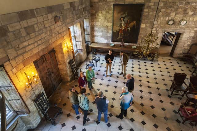 Looking down at visitors in the Great Hall from the gallery at Treasurer's House, York. Image: Annapurna Mellor/National Trust
