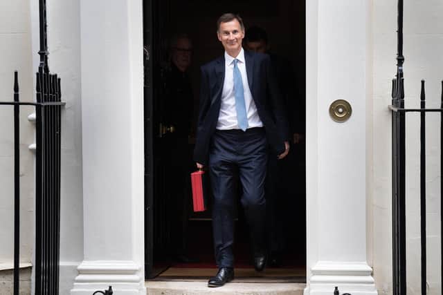 Chancellor of the Exchequer Jeremy Hunt leaves 11 Downing Street, London, with his ministerial box before delivering his Budget at the Houses of Parliament. Picture: PA