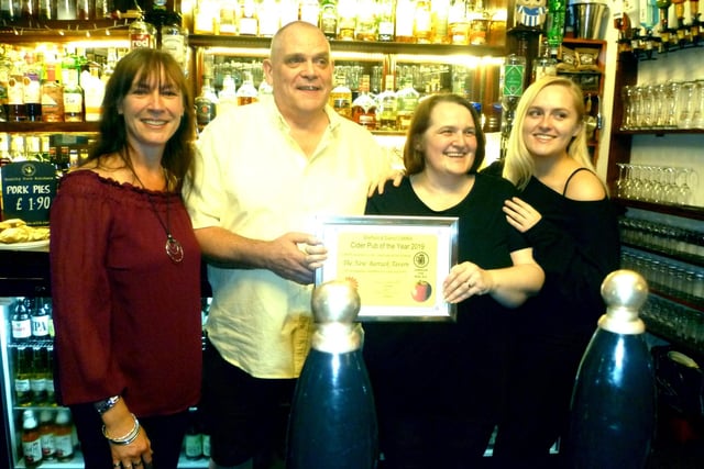 It's not just about the beer. Cider pub of the year award for 2019 went to the New Barrack Tavern, Penistone Road, Sheffield. Pictured left to right are Sarah Mills from CAMRA, managers Kev and Steph Woods and their daughter Rebecca