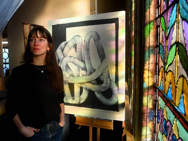 Artist Cat Spilman pictured at work at Southlands Methodist Church, York. Picture by Simon Hulme