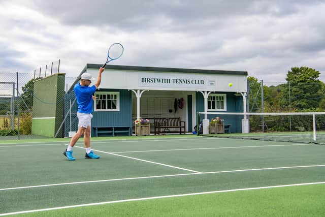 Birstwith near Harrogate boasts its own tennis courts and pictured is a player at Birstwith Tennis Club.