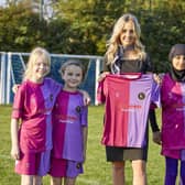 Harriet Walker with Chanterlands Girls Football Club players, from left, Evelyn Moult, Lilly Halliday, Rania Bilbas and Willow Gilligan.