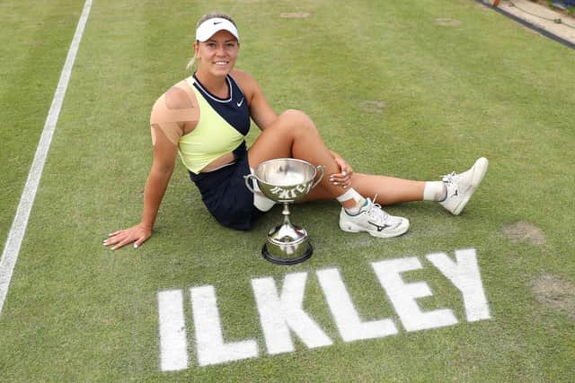 Dalma Galfi of Hungary poses with the Ilkley Trophy following victory in last year's Ilkley Trophy final (Picture: Lewis Storey/Getty Images for LTA)
