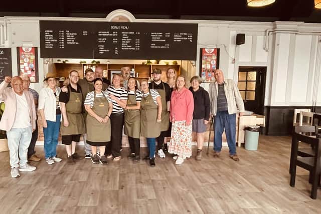Staff, councillors and members of the Rose Garden Cafe Partnership celebrate the reopening of the cafe in Graves Park, Sheffield. Picture: Andy Kershaw