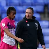 Huddersfield Town's David Kasumu (left) appears dejected, alongside manager Mark Fotheringham after the Sky Bet Championship match at the Select Car Leasing Stadium, Reading. Picture: Nick Potts/PA Wire.
