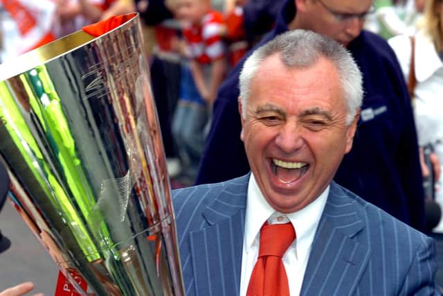 Happier times: Doncaster Rovers chairman John Ryan holds aloft the Johnstone's Paint Trophy as he makes his way to the Mansion House in 2007 (Picture: Marie Caley)
