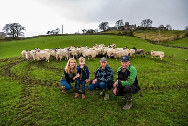 Farmer/Shepherdess Heather Challis, 27, of Halfway House Farm, Middlesmoor, Lofthouse, near Pateley Bridge, North Yorkshire. Pictured Heather Challis, with her three year old son Billy Challis-Hardcastle, uncle Carl and her father Neil infront of flock of Dales Mule Sheep.
