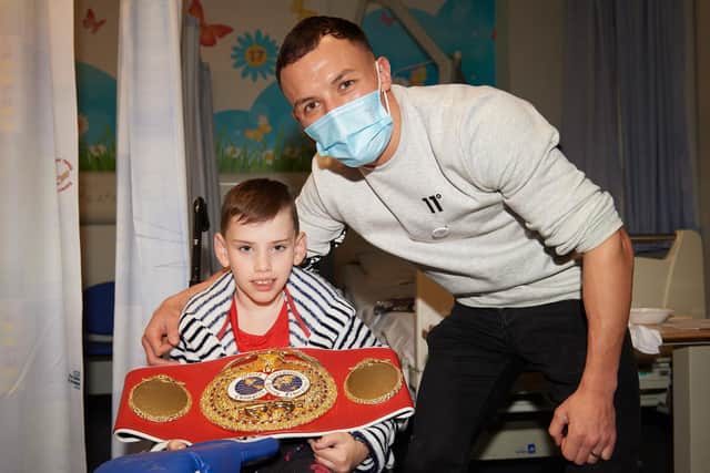 Josh Warrington visits Leeds Children’s Hospital to meet Leighton Gorringe, 11. (Picture: Matthew Pover/Matchroom)