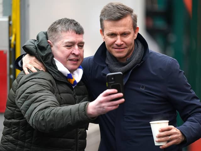 Former Leeds United manager Jesse Marsch (right) takes a photo with a fan ahead of the Emirates FA Cup fourth round match at the Wham Stadium, Accrington in January
