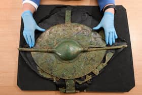 Archaeologist Paula Ware with the shield she dug up in Pocklington as part of an amazing chariot burial pictured at MAP, Malton, North Yorkshire. Picture by Simon Hulme 14th February2023