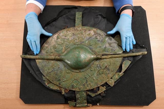 Archaeologist Paula Ware with the shield she dug up in Pocklington as part of an amazing chariot burial pictured at MAP, Malton, North Yorkshire. Picture by Simon Hulme 14th February2023
