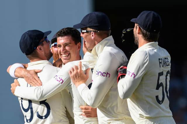 Matthew Fisher is overjoyed after taking his first Test wicket at Barbados in March. Photo by Randy Brooks/AFP via Getty Images.