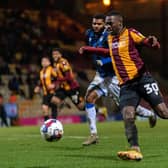 Bradford City goalscorer Abo Eisa and Rochdale captain Ethan Ebanks-Landell chase the ball in Tuesday's game. Picture: Bruce Rollinson