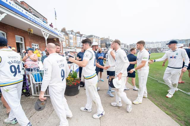 Well played, gentlemen. Yorkshire shake hands with the Derbyshire players. Picture by Allan McKenzie/SWpix.com