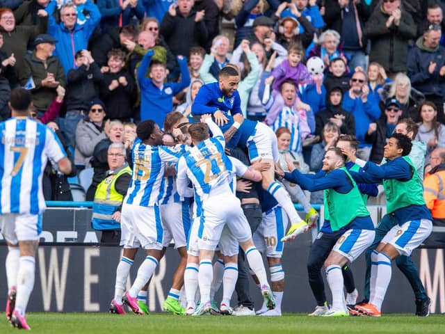 The ecstatic scenes which followed Rhys Healey's dramatic late winner for Huddersfield Town in their last Championship home game against Millwall a fortnight ago. Picture: Bruce Rollinson.