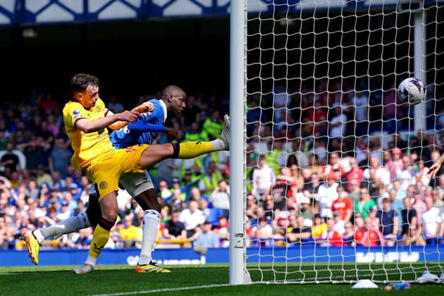 Everton's Abdoulaye Doucoure scores their side's first goal of the game during the Premier League match at Goodison Park. Photo: Peter Byrne/PA Wire.