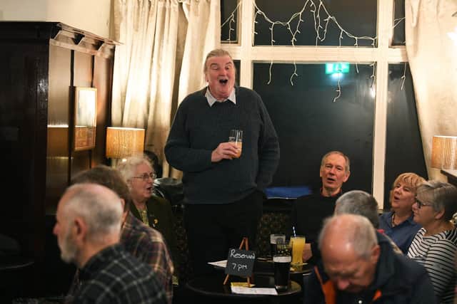 Ecclesfield Carols is an unbroken tradition, spanning 200 years, of singing in pubs. It begins the week after Armistice, in Sheffield villages, and is 'carols as it used to be'. Now, with fewer pubs, they've found a new home at The Greyhound. 
John Bowden sings a solo.
Picture Jonathan Gawthorpe
