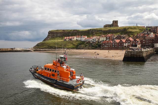 Whitby's all-weather lifeboat was called out to help tow a broken down pleasure boat during the fundraising at  Whitby Lifeboat Weekend. Saturday 5 August. Picture: Ceri Oakes
