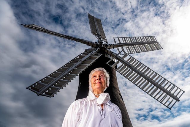 Ulla Wilberg, one of the volunteers at Holgate Windmill, standing outside the mill.