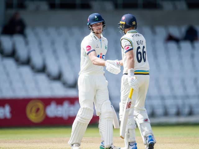 Fin Bean, congratulated on reaching his 150 against Glamorgan by Joe Root, has not looked out of place in a star-studded Yorkshire top-order as the young left-hander goes from strength to strength. Picture by Allan McKenzie/SWpix.com - 05/05/2024