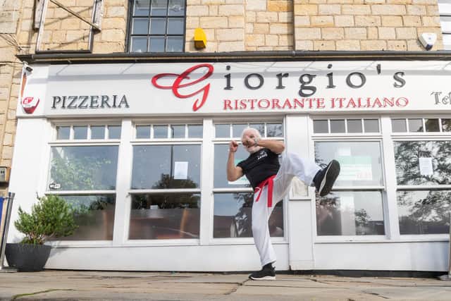 George Psarias owner of Giorgio's Ristorante Italiano, in Headingley, Leeds, has at the grand age of 75 taken up Karate after his grandchildren started at the local club. George, has been taking part in lesson twice a week and has just earned his red belt.