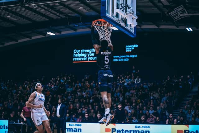 Slam dunk: Jalon Pipkins rams home a two-pointer for the Sharks (Picture: Adam Bates)