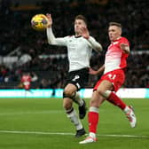 Derby County's James Collins (left) and Barnsley's Jack Shepherd battle for the ball during the Sky Bet League One match in November. Picture: Barrington Coombs/PA Wire.