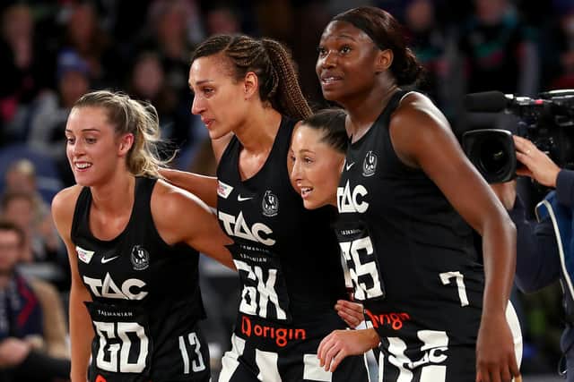 Zoe Davies, left, and Geva Mentor, second left, celebrate during their time together at Collingwood Magpies (Picture: Kelly Defina/Getty Images)