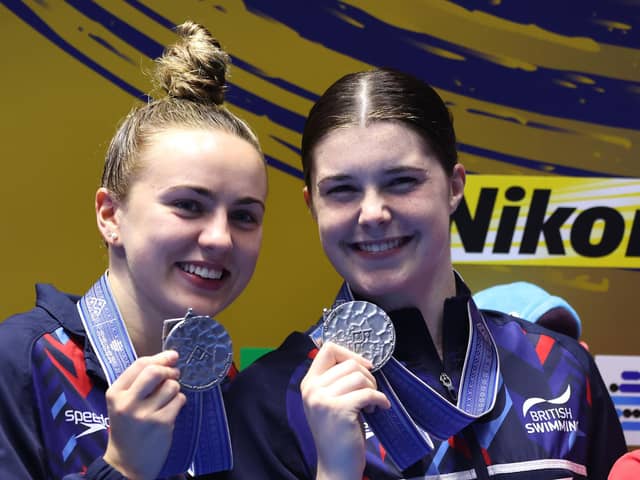Silver medalists Andrea Spendolini Sirieix (R) and Lois Toulson of Team Great Britain pose during the medal ceremony for the Women's Synchronised 10m Platform on day three of the Fukuoka 2023 World Aquatics Championships (Picture: Sarah Stier/Getty Images)