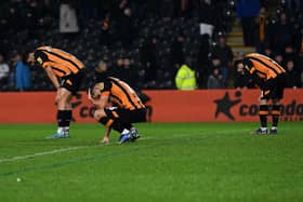 Hull's dejected players at full-time of the defeat to Reading (Picture: Jonathan Gawthorpe)
