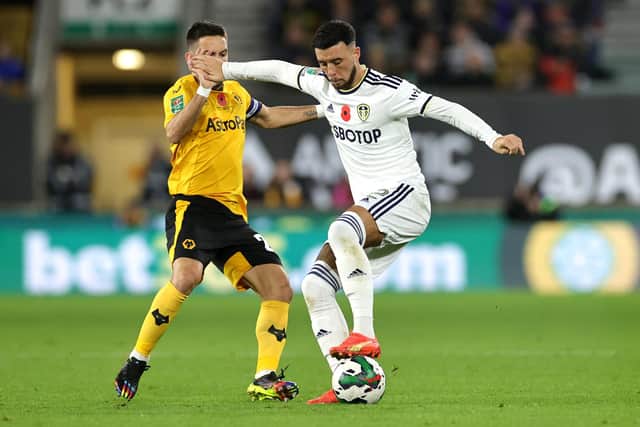 Sam Greenwood of Leeds United is challenged by Joao Moutinho of Wolverhampton Wanderers during the Carabao Cup Third Round match. (Picture: David Rogers/Getty Images)