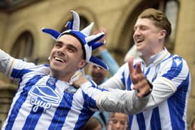 Reece James and George Byers celebrate Sheffield Wednesday's promotion in the new EyUp-sponsored shirts they will be wearing for the 2023/24 season.  Picture: Steve Ellis