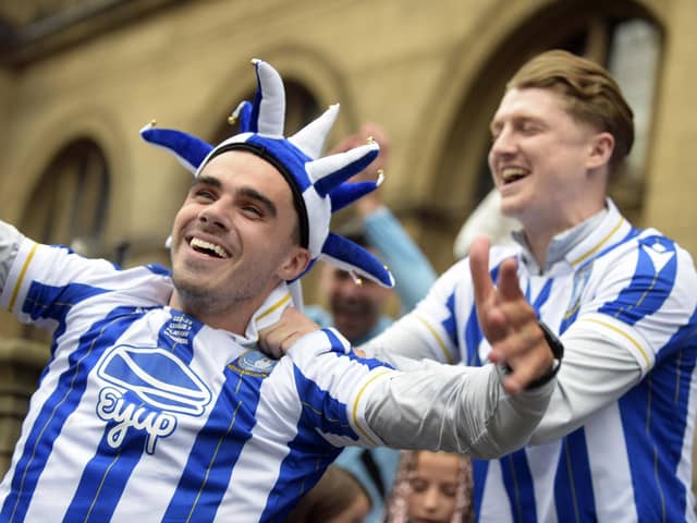 Reece James and George Byers celebrate Sheffield Wednesday's promotion in the new EyUp-sponsored shirts they will be wearing for the 2023/24 season.  Picture: Steve Ellis