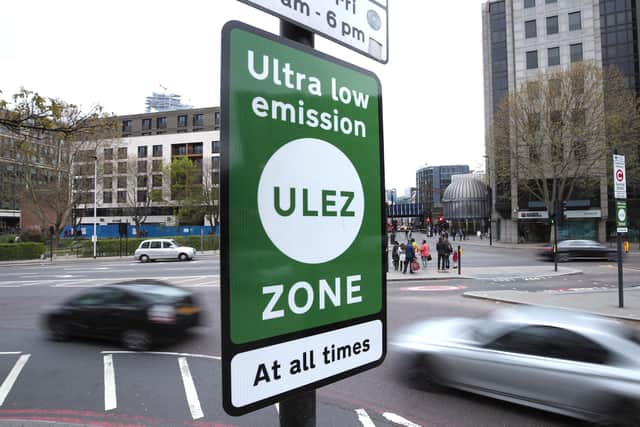 An information sign at Tower Hill in central London for the Ultra Low Emission Zone (ULEZ). PIC: Yui Mok/PA Wire