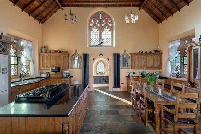 The kitchen dining area with the original chapel wondows