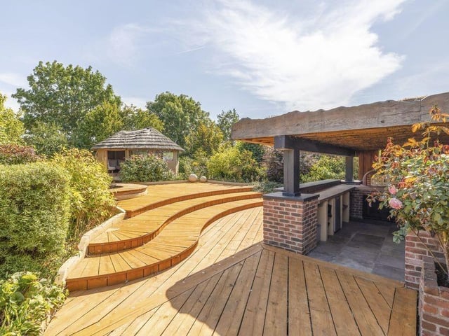 Sliding doors provide a direct link between the party room and the landscaped grounds.
